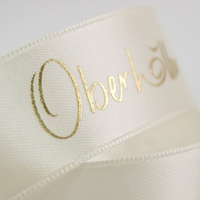 Double satin ribbon with gold embossing Image